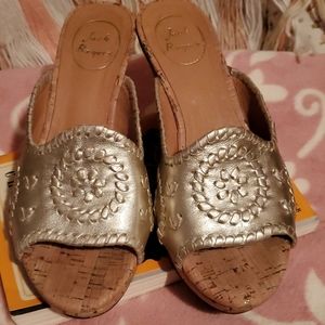 Jack Rodgers silver slip on wedge shoes.